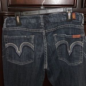 SZ 26 Seven for all Man kind dark jeans.